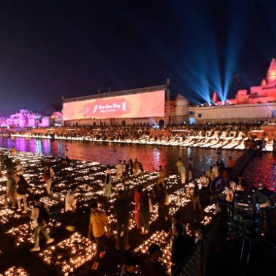 AYODHYA, INDIA  NOVEMBER 11: People lighting earthen lamps at Ram ki Paidi during Diya Deepotsav (Diwali celebrations) on November 11, 2023 in Ayodhya, India. Ayodhya is all set to celebrate a grand 'Deepotsav' on the eve of Diwali as 24 lakh traditional earthen lamps, or diyas, at 51 ghats of Saryu river will illuminate the temple city at the same time, setting a world record. The festivities would commence at 3pm and would be inaugurated by chief minister Yogi Adityanath. Almost the entire UP cabinet ministers along with the High Commissioners and Ambassadors of over 50 countries will also participate in the program. (Photo by Deepak Gupta/Hindustan Times via Getty Images)