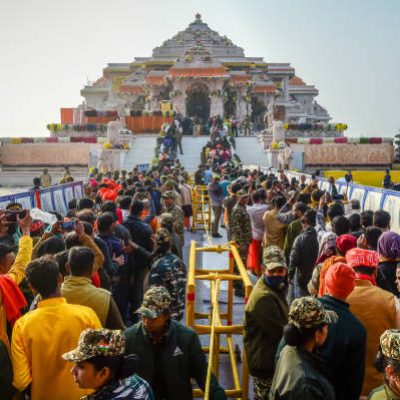 AYODHYA, INDIA - JANUARY 23: Devotees queue to get glimpse of a statue of the hindu god Ram one day after consecration ceremony of the Ram Mandir on January 23, 2024 in Ayodhya, India. The Ram Mandir, a temple built at a site thought to be the birth place of Lord Rama, a significant figure in Hindu religion, was inaugurated on Jan. 22, 2024. (Photo by Ritesh Shukla/Getty Images)